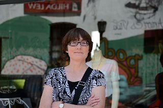 11 Charlotte Ryan With Graffiti Street Art Reflected In The Window Of Mishka On Balcarce San Telmo Buenos Aires.jpg